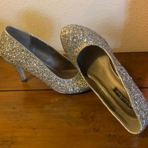 Micheal Antonio silver heels